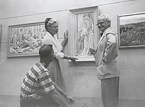 Barbara Latham (left), Sam Smith and Will Shuster (Right) were jurors of the 1957 Fiesta Show. MNM Neg. No. 20774